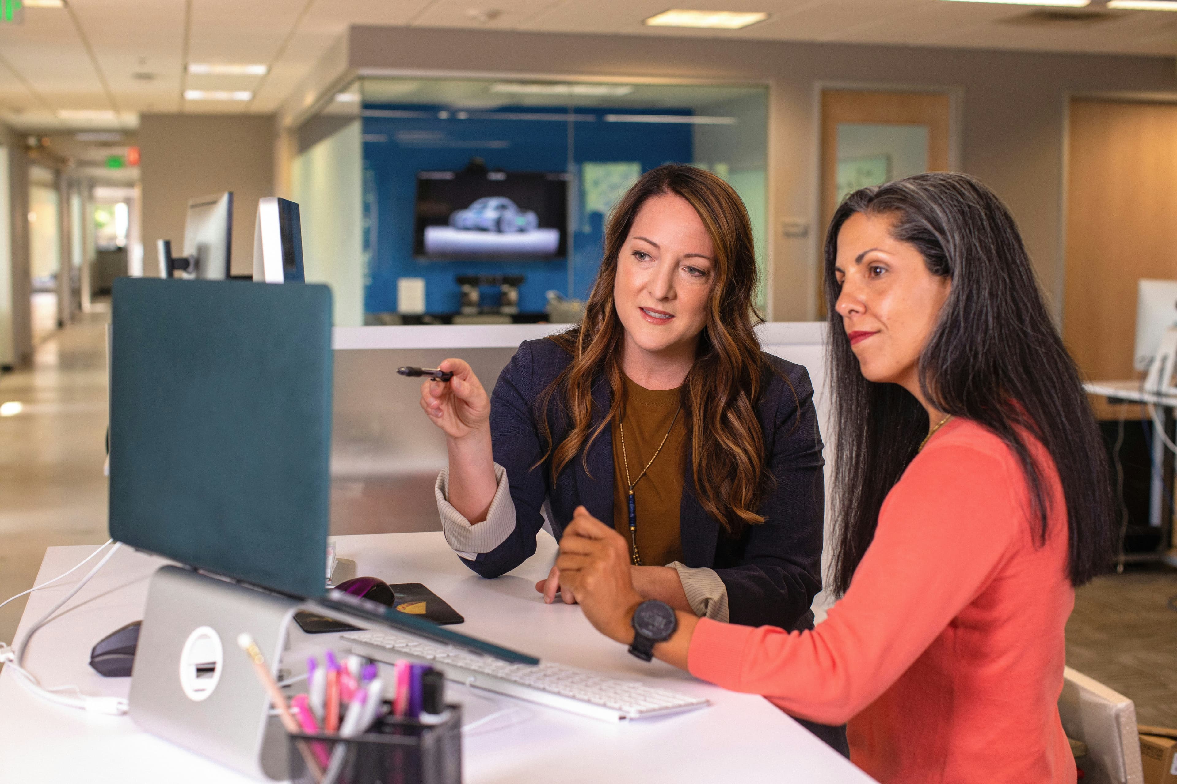 Colleagues learning together at work